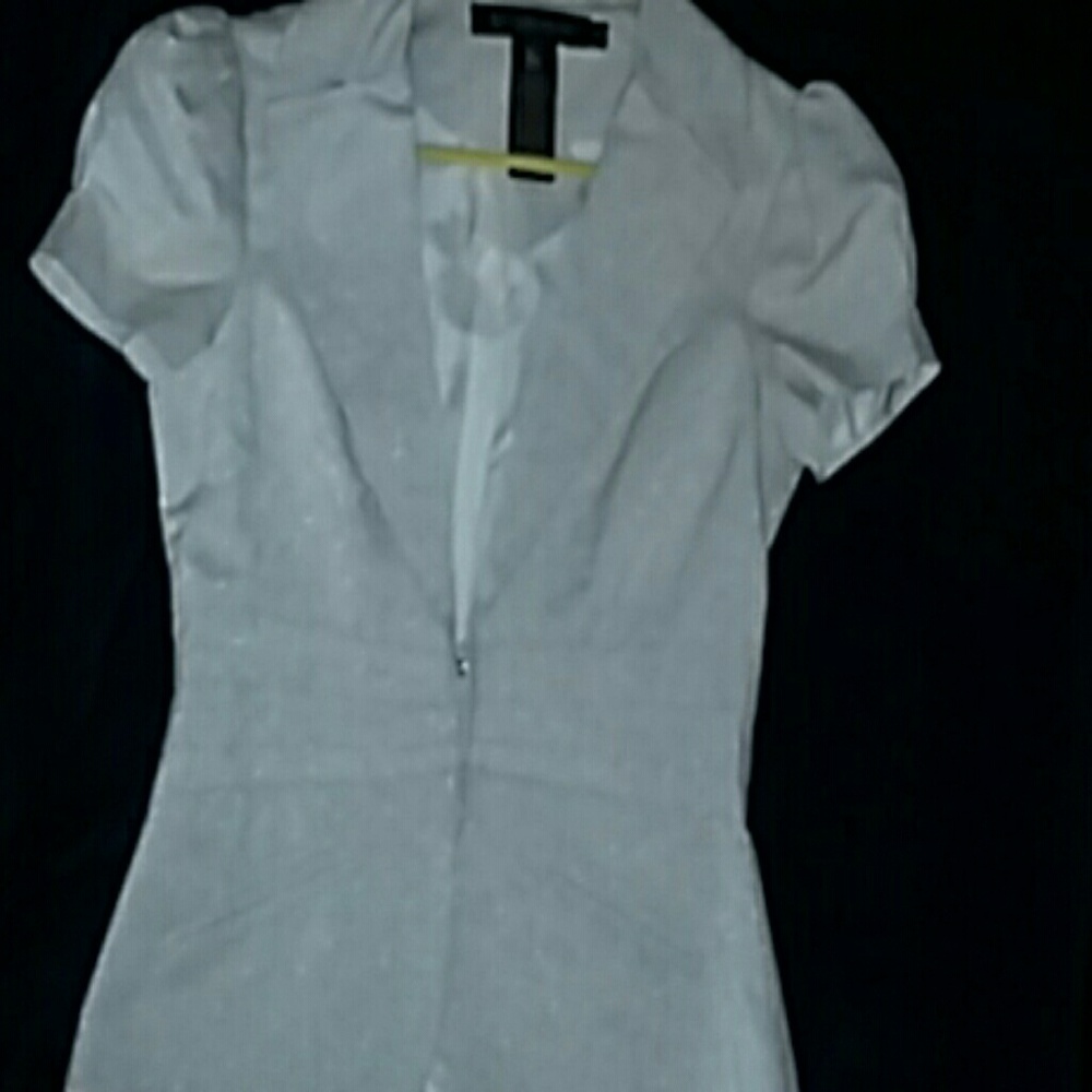 Silver short sleeve blazer. NEVER worn NO tags